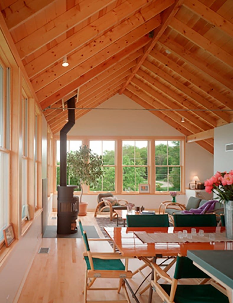 Imagen de Casa de madera sobre pilotes de hormigón: Osprey House en Canexel interior casa de madera prefabricada