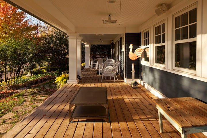 Imagen de Encantadora casa de campo en Minnesota en Canexel porche de casa de madera