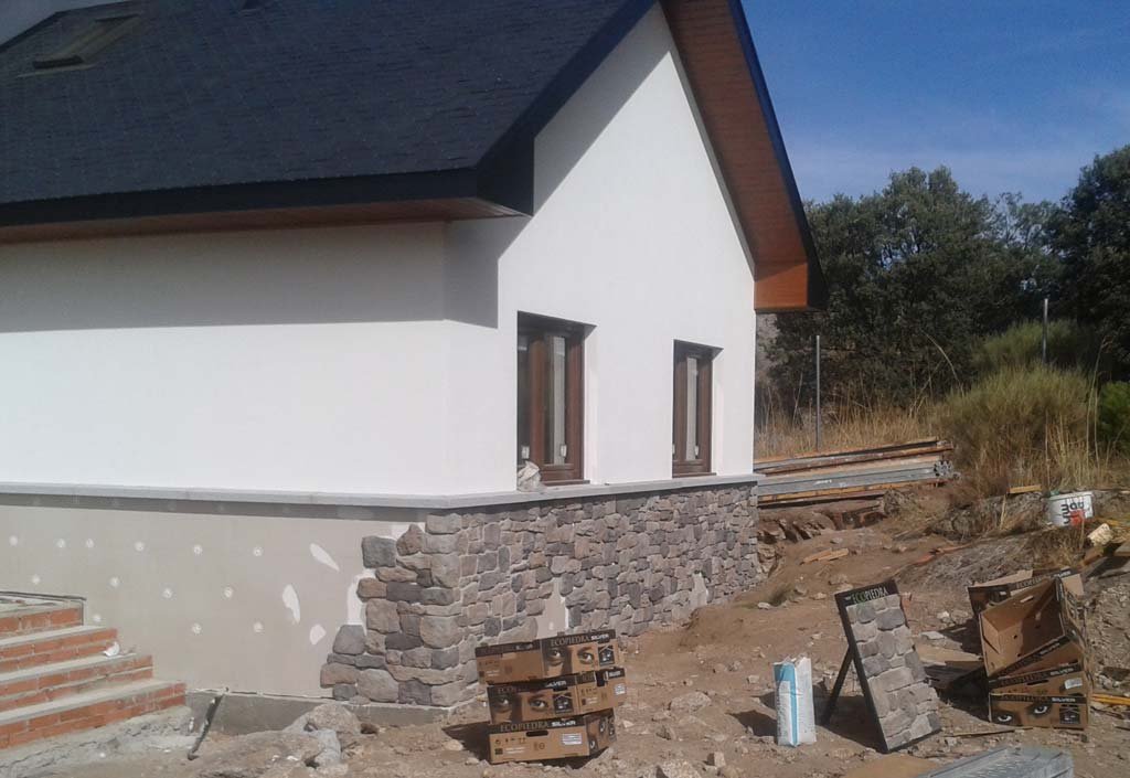 Imagen de Nuevo revestimiento para casas de madera, la piedra sintética en Canexel superficie de colocacion ecopiedra
