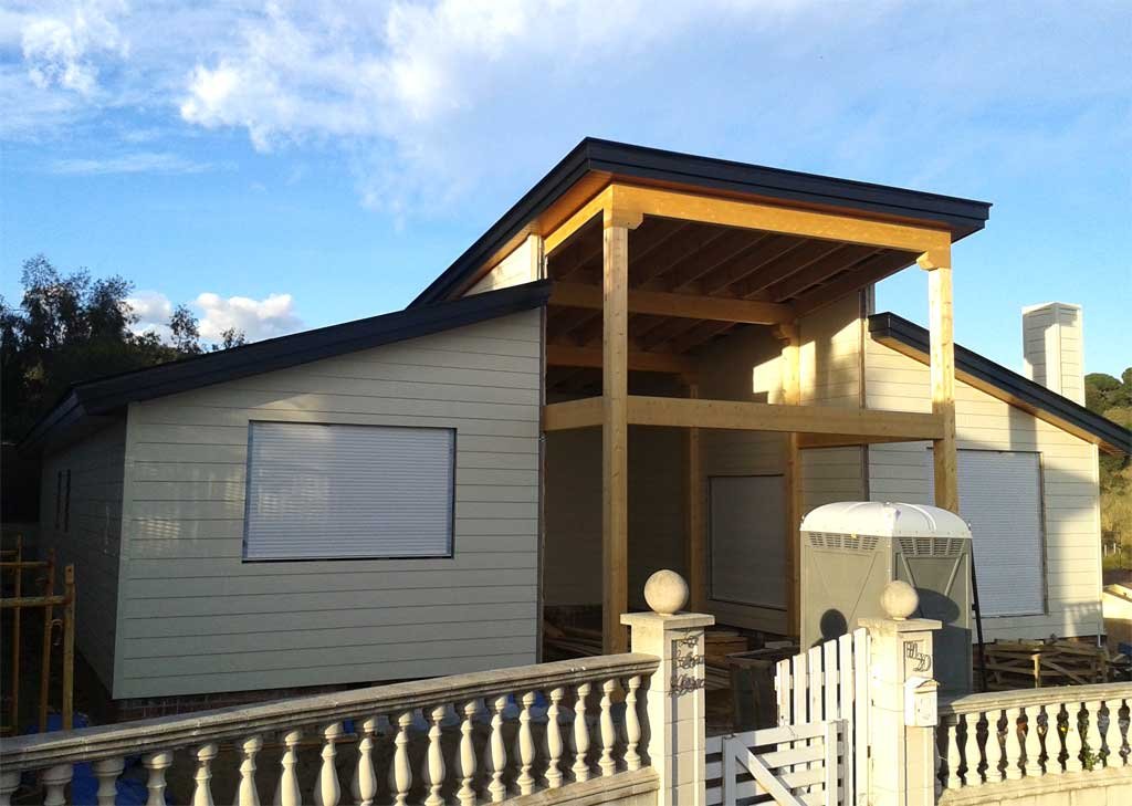 Imagen de Tejado de pizarra para casas de madera en Canexel fachada principal