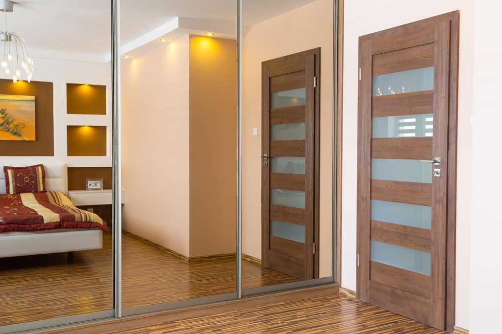 Imagen de Ideas para la decoración de dormitorios en Canexel armario de espejo